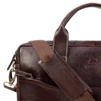 leather-laptop-bag-brown-close-up-shoulder-strap-detail - VILL OKSE