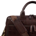 leather-laptop-bag-brown-closeup-strap-padding-and-handle - VILL OKSE