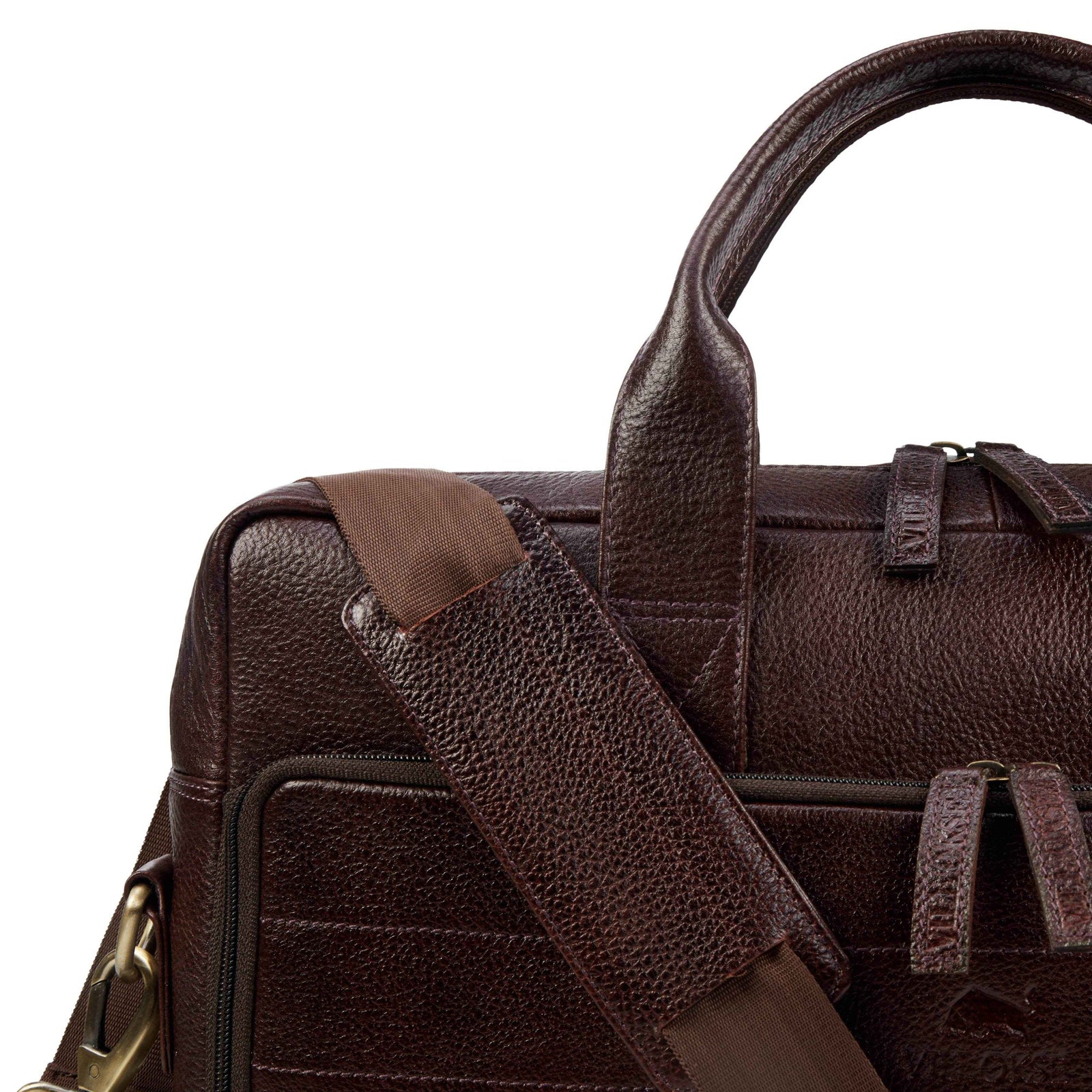 leather-laptop-bag-brown-closeup-strap-padding-and-handle - VILL OKSE
