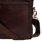 leather-laptop-bag-brown-closeup-textured-front-pocket-strap - VILL OKSE