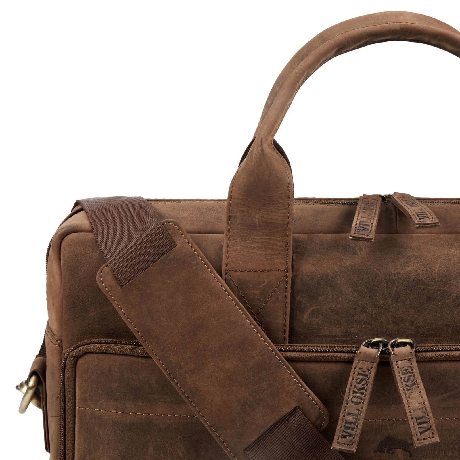leather-laptop-bag-closeup-sturdy-handle-shoulder-strap - VILL OKSE