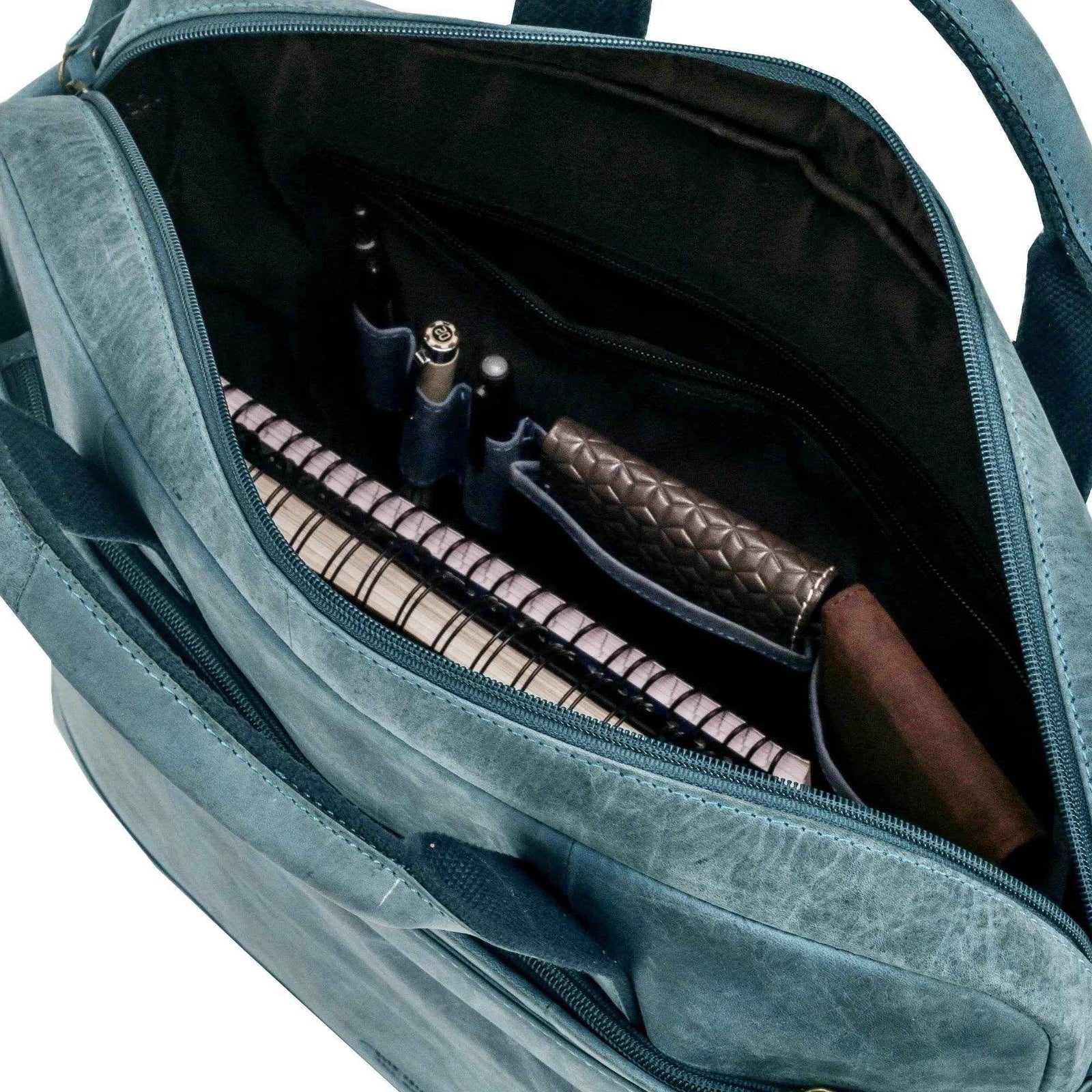 villokse-laptop-bag-blue-leather-filled-pen-and-notebook-pocket - VILL OKSE