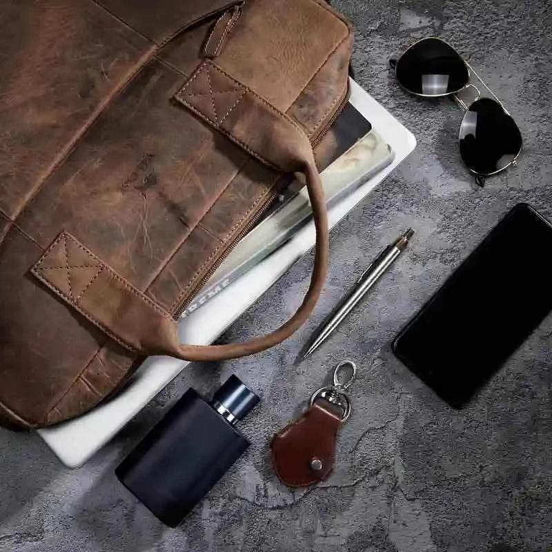 vilo-craft-laptop-bag-brown-leather-lifestyle-with-accessories - VILL OKSE